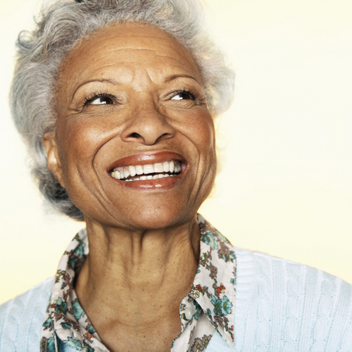 Woman smiling about her successful root canal by Hunter Dental Care in Portland, OR Woman smiling about her successful root canal by Hunter Dental Care in Portland, OR